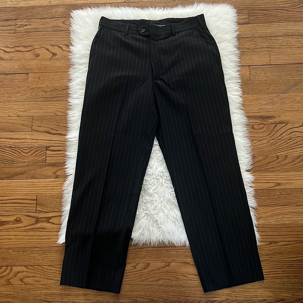 Elite man’s suit pants. Black striped